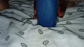 Inserting the bottle deep into the
