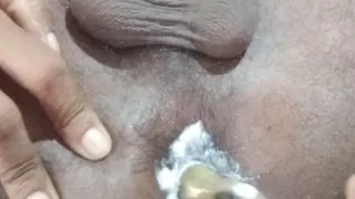 Inserting an iron into the rectum