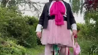 Dressed in a pink polka dot skirt for a party