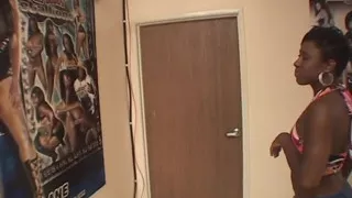 Slender black slut gets her cunt licked by a dude in an office