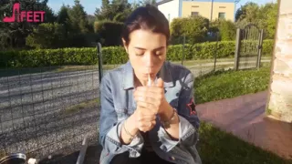 Petra smokes her ciggaretes outdoor