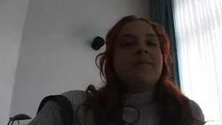 Hairy redhead bbw fingers her pussy on the bed