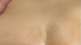 Massive cum explosion on her shiny oiled ass