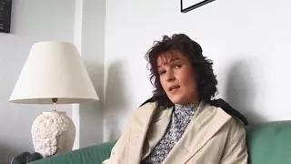 Brunette lady is fingering her pierced pussy