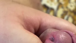 Fat man lying on the couch shows his ass and cums without hands, a lot of cum, cum, uncircumcised penis