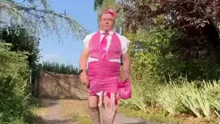 Dressed in a tight pink dress for an evening out