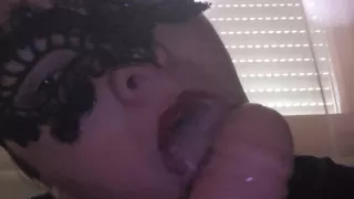 sucking a dildo