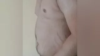 The cock is standing in the underwear.
