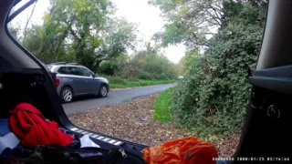 Just getting changed parked at side of road with cars driving past
