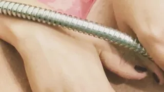 Horny wife with an enema and anal beads in her tight ass.
