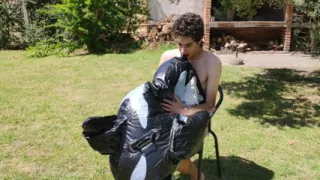 Beautiful Man Inflates His Inflatable Whale Near Pool Outside