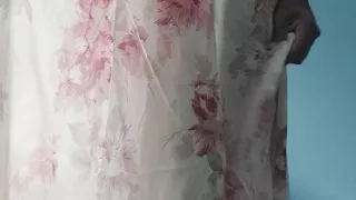 I'm masterbating in a flowery flowing silky seethrough fleard skirt and cum
