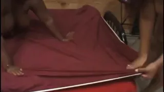 Two large ladies share a dildo