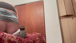 The crossdressing dad rides a toy