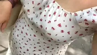 A MILF walks around the city and touches her pussy.