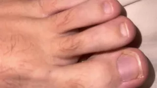Showing feet & hairy winking asshole
