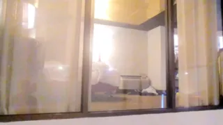 Caught Watching Her in Hotel Window and She Gives Him a Show