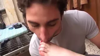 Nylon fetishist licking feet and jerking off