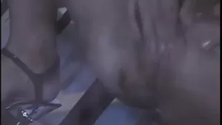 Sexy babe in heels keeps her slave in prison for her sexual needs