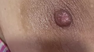 Mom oils herself very delicious and massages her tits