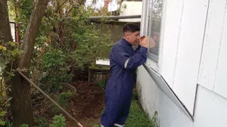 An unfaithful wife invites the gardener inside after he watches her through the window.