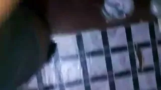 African amatuer stripping and spraying milk