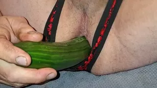 Ass play with a cucumber