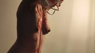 Red Liquid Is Pouring on a Beautiful Girl. Art Project