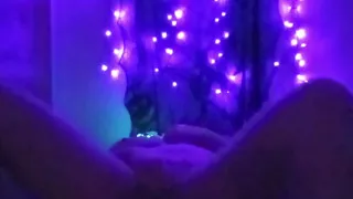Neon clown girl making herself cum