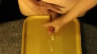 Slim young boy shoots some jizz.