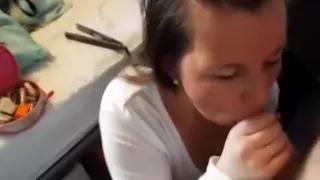 Girl On Her Knees Blowing Her Guy'S Cock