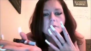 Busty Redhead Shows Off Her Sexy Nails