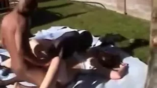 Attractive girl likes black dicks underneath the sunlight