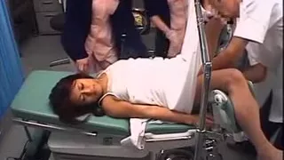 Beautiful Japanese babe gets her pussy examined in the doct
