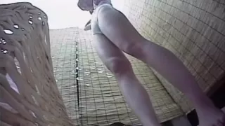 Hidden camera in a beach shower films babes showering and p