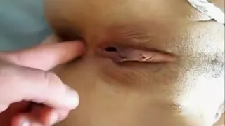 Prepairing her tight asshole with his finger