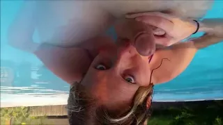 Amateur teen beauty sucking cock in the pool