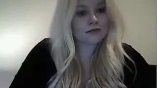 Gorgeous young blonde massages her big natural breasts for