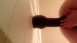 Anal instruction with wall dildo