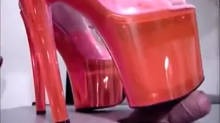 Chick in super high heels is crushing his poor pecker under