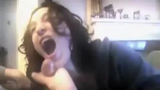 Folding over and spreading her cunt lips open