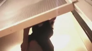 Peeping tom uses a spycam to watch a sexy babe changing in