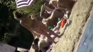 The family that sunbathes in the nude together, stays toget