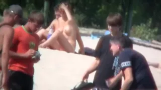 Hot young bombshells take off their bikinis to sunbathe in