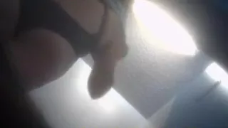 Hidden cam down below shows a sexy chick with a nice ass ta