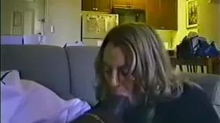 Partner swallows a heavy fill of her dark partner's cum