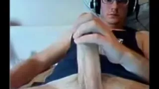 Canadian guy with a huge thick giant massive dick and glasses cums on cam