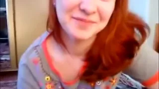 Cute redhead gives a blowjob in the chatroom