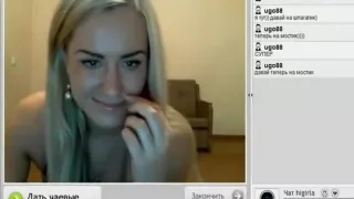 beautiful blonde sits on the twine on the floor