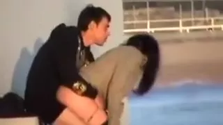 A couple caught in sex by the river